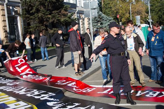 Moscow, Russia - September 21, 2014. Police confiscated some posters with peace March Peace March in Moscow against war with Ukraine