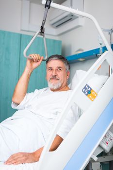 doctor or nurse talking to patient in hospital