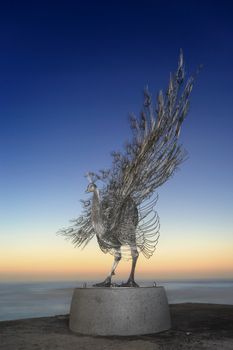BONDI, AUSTRALIA -  OCTOBER 25, 2014; Sculpture by the Sea Annual Event 2014.  Sculpture titled Our Memory in Your Place by Byeong Doo Moon, South Korea.  Materials, stainless steel, granite  Price $128000