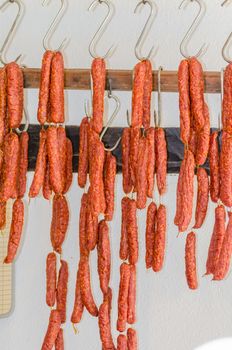 LWL-Open-Air Museum Hagen. 
Images courtesy of the Department of Public Relations. 
Traditional food. Smoked sausages hanging on a pole for sale in a butcher shop.