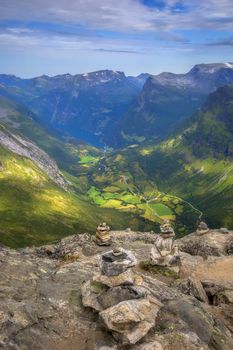 The Geiranger fjord in Norway, surrounded by high mountains