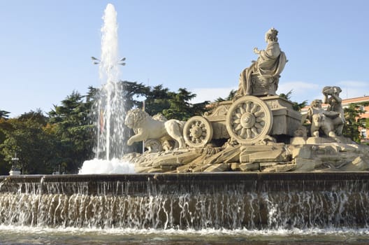 Sculpture Cibeles showing the Goddess Cybele and her chariot, pulled by two lions in Madrid, Spain.