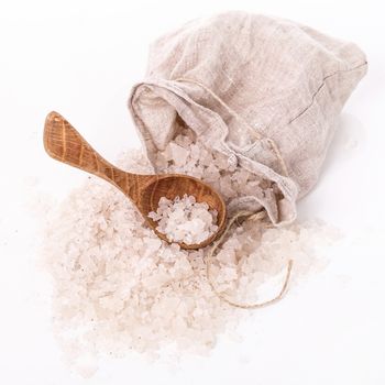 Heap of sea salt on a white background