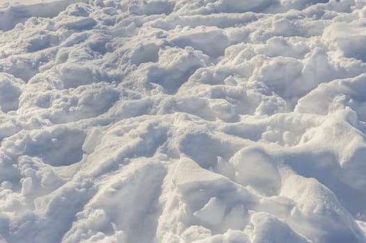 chaotic human tracks on the fresh white snow