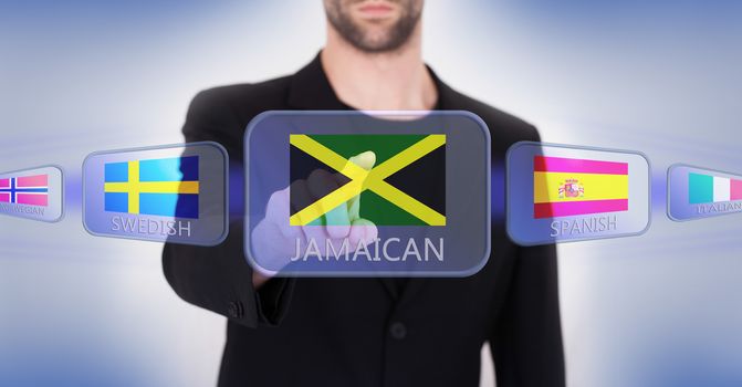 Hand pushing on a touch screen interface, choosing language or country, Jamaica