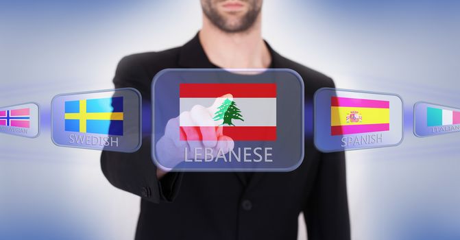 Hand pushing on a touch screen interface, choosing language or country, Lebanon