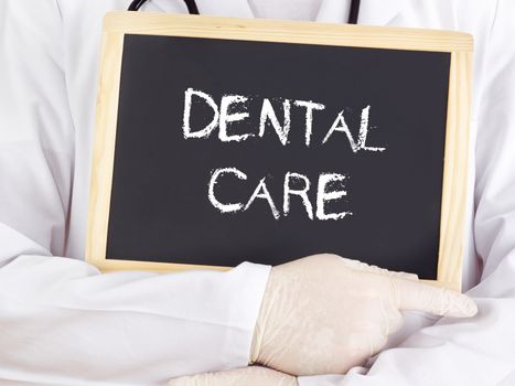 Doctor shows information: dental care