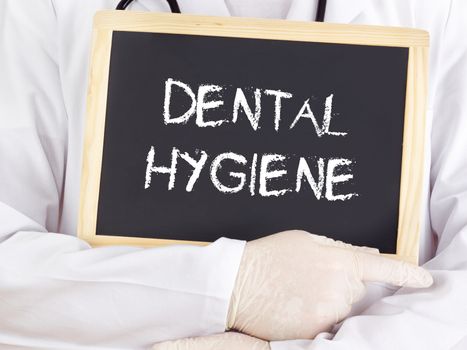 Doctor shows information: dental hygiene