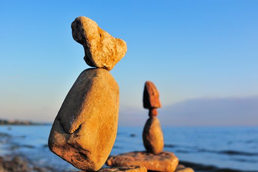 Zen balance of boulders on the seacoast