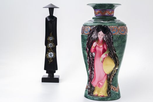 Vase with carved bas-relief of Vietnamese girls