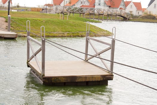 ferry raft floats on the water