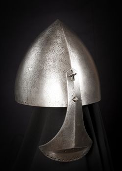 Iron helmet of the medieval knight. Very heavy headdress