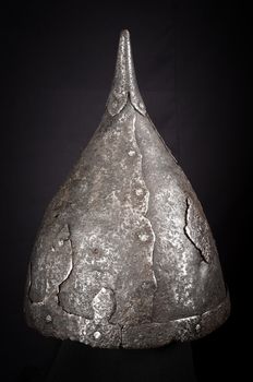 Iron helmet of the medieval knight. Very heavy headdress