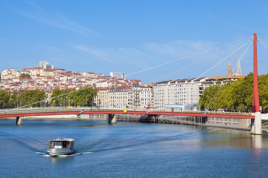 View on Lyon and Saone river with boat, France