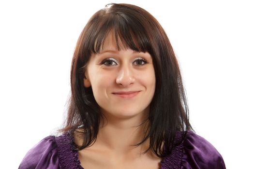 An smiling beautiful brown haired woman on white background