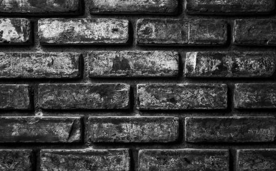Old brick wall texture in black and white.