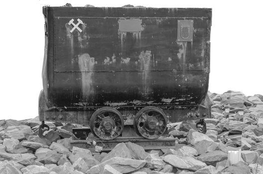 The open box-shaped tram is referred to in the miners' language as Lore or Hunt / dog. shot in black and white