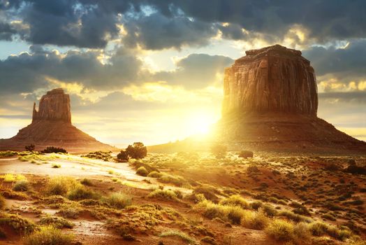 Sunset at the sisters in Monument Valley, USA