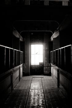 Dark and abandoned interior of a power plant