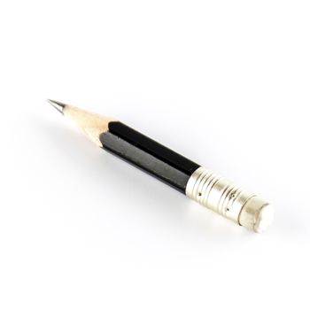 short black pencil on a white background