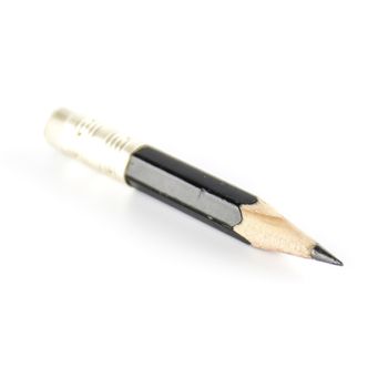 short black pencil on a white background