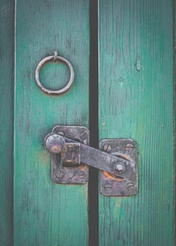 Retro Filtered Photo Of A Rustic Door Latch