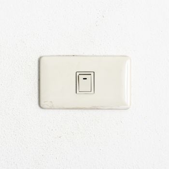 electric white switch on wall