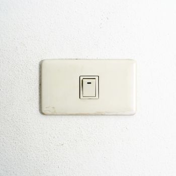 electric white switch on wall