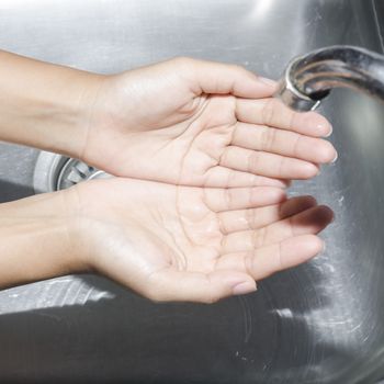 woman washing of hands