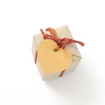 heart tag with single craft cardboard gift box on a white background