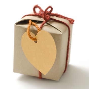 heart tag with single craft cardboard gift box on a white background