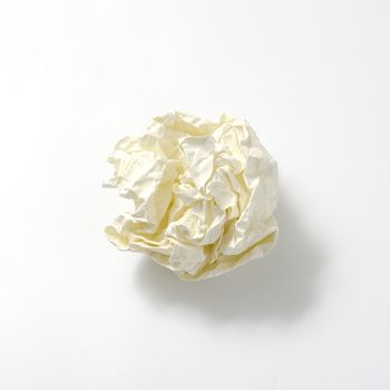 crumpled paper ball on a white background
