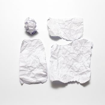 piece of white crumpled paper on a white background