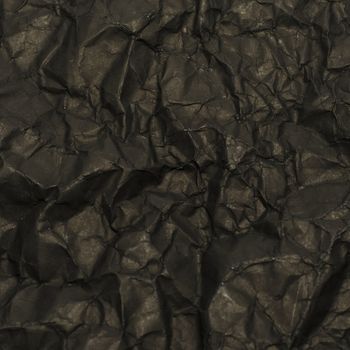 black crumpled paper texture background