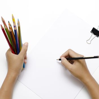 asia woman right hand with black pencil and left hand with colorful pencil on blank white paper over white background