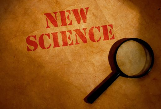 Magnifying glass next to new science heading