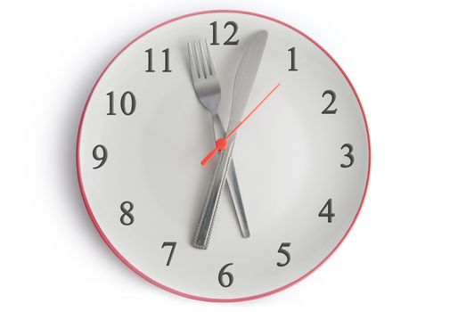Plate with fork and knife as clock hands 