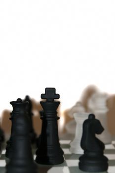 chess pieces in sepia isolated against a white background