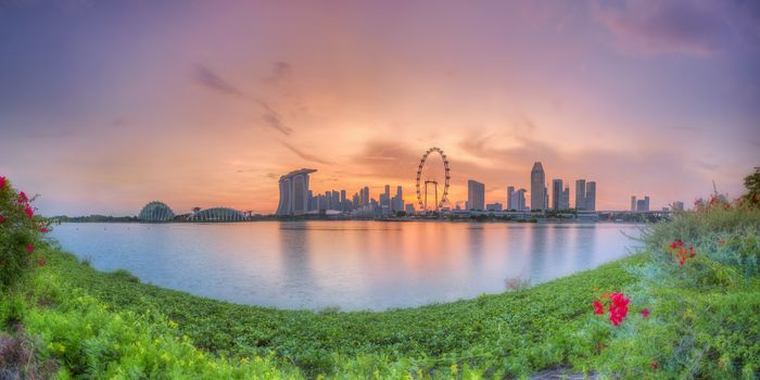 Panorama view of Singapore city skyline at sunset