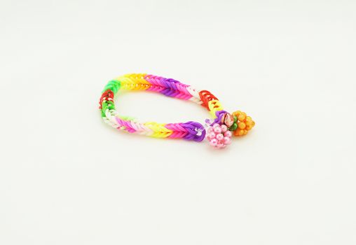 Beautiful bracelet knit from a small rubber band with various colors.                              