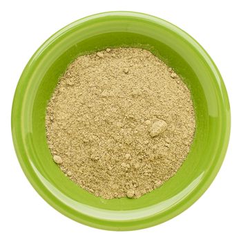 hemp protein powder  on an isolated green bowl