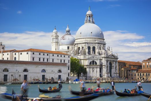Gondolas on Canal Grande with Basilica di Santa Maria della Salute in the background, Venice, Italy 