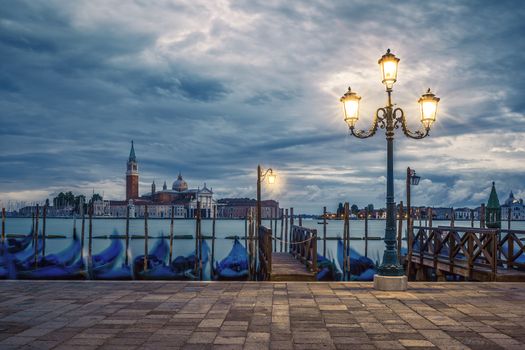 Gondolas floating in the Grand Canal on a rainy day, Venice