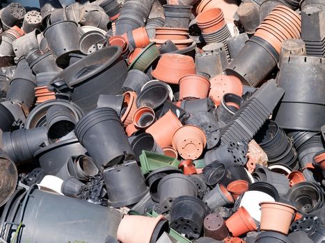 pile of plastic flower pots