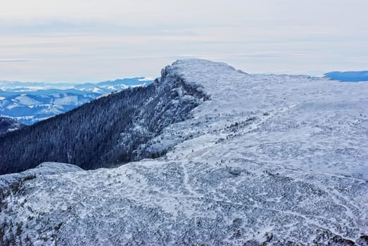 Winter mountain landscape in Romanian Carpathians.