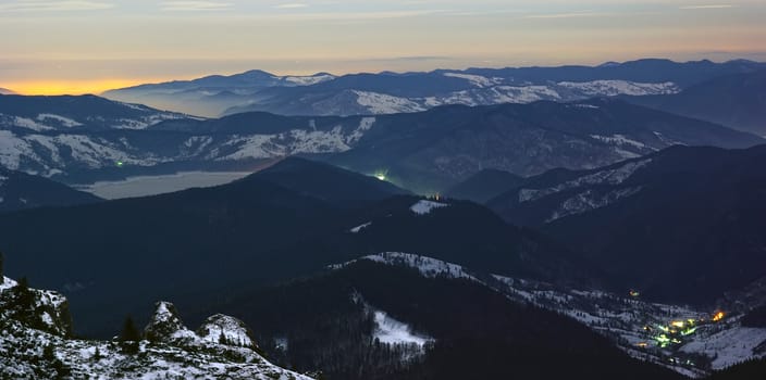 Evening lights from the mountains, Romanian Carpathians.