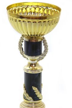 Gold cup isolated on a white background.