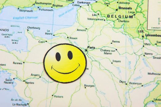 Close up image of a smile face on France map.