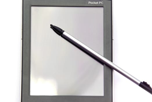 Pocket pc: touch screen display and stylus, close up image.