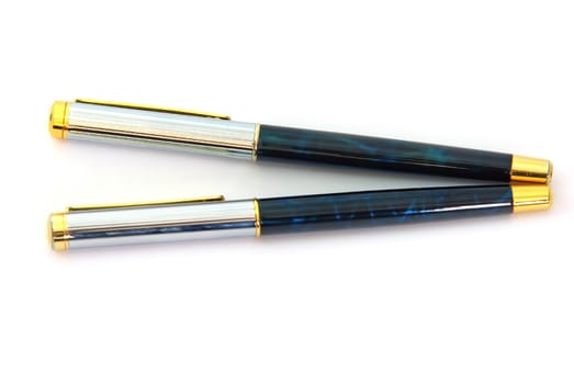 Close up image of two pens isolated on white